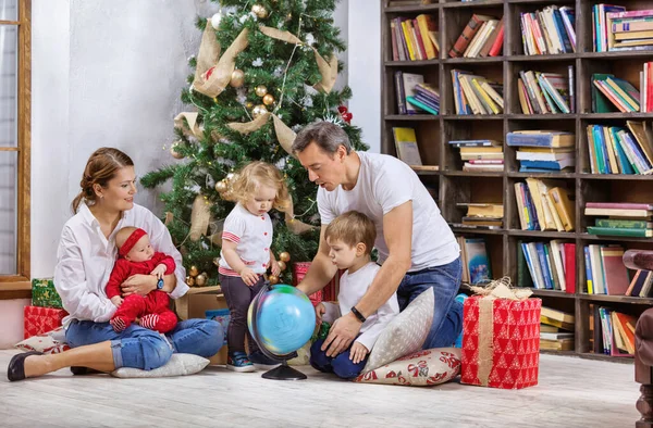 Family Three Children Christmas Tree Home Kids Father Examining Globe — Stock Photo, Image