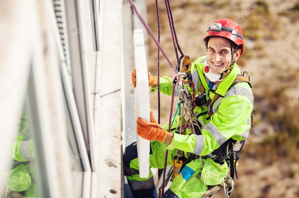 Industrial climber on a building