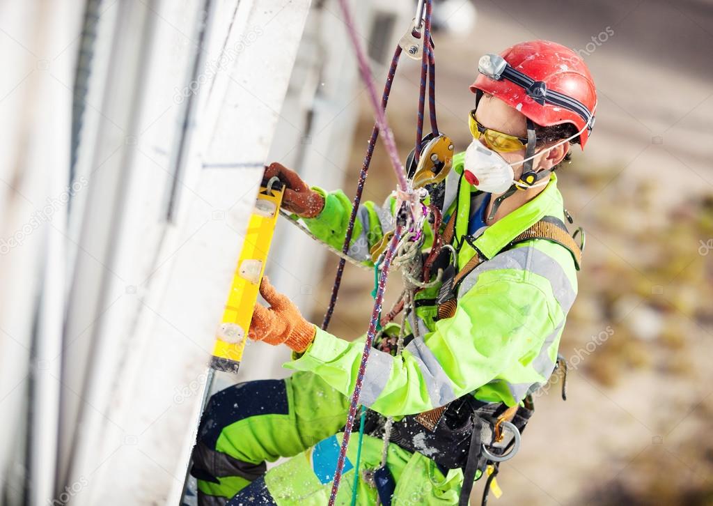 Industrial climber on a building