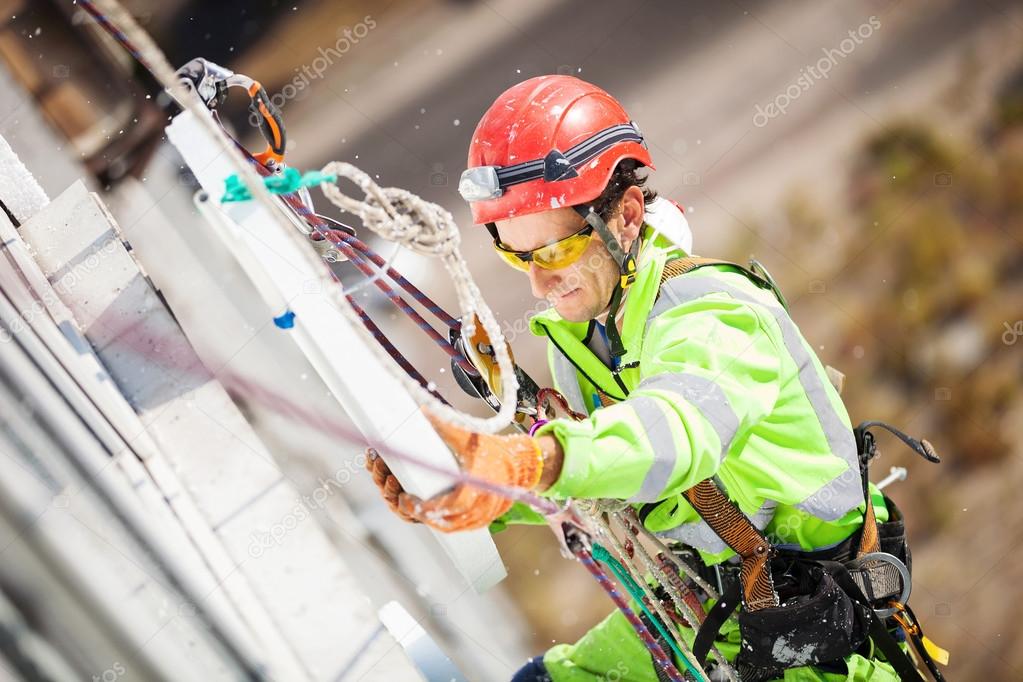 Industrial climber on a building