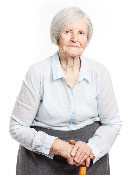 Porträt einer Seniorin, die in die Kamera blickt. über weißem Hintergrund. — Stockfoto