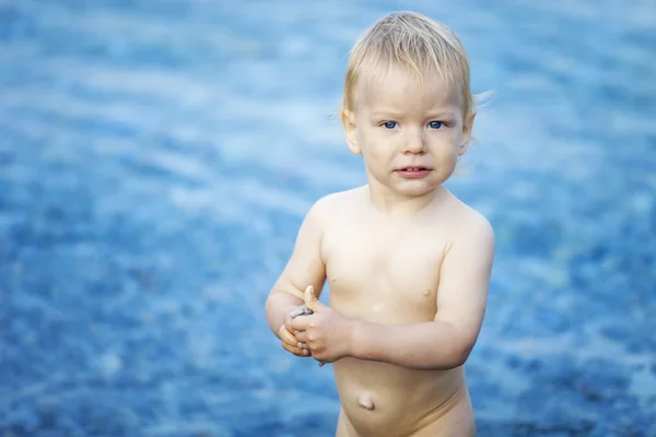 Baby boy on a tropical beach — Stock Photo, Image