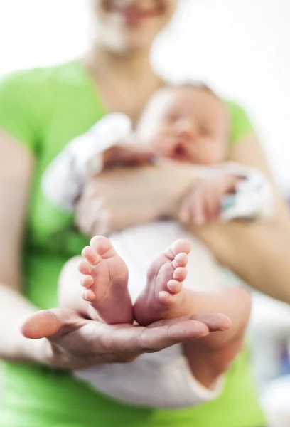 Mother holding newborn baby boy — Stock Photo, Image