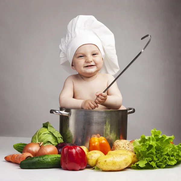 Little boy in chef's hat Stock Picture