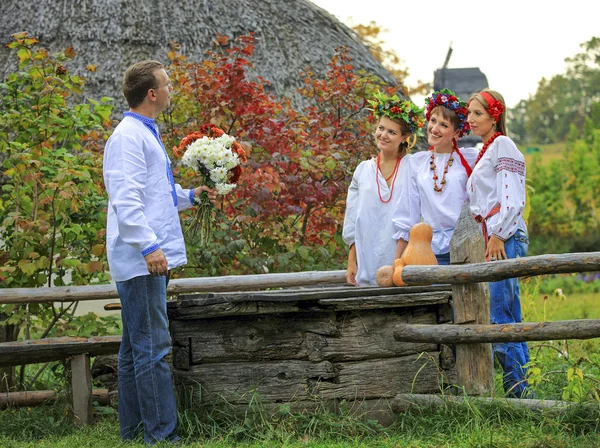 People in Ukrainian style clothing — Stock Photo, Image