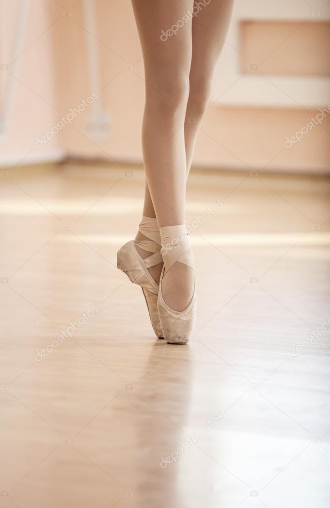 Legs of young ballerina