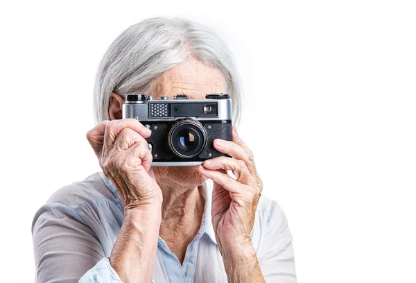 Woman shooting with retro camera — Stock Photo, Image