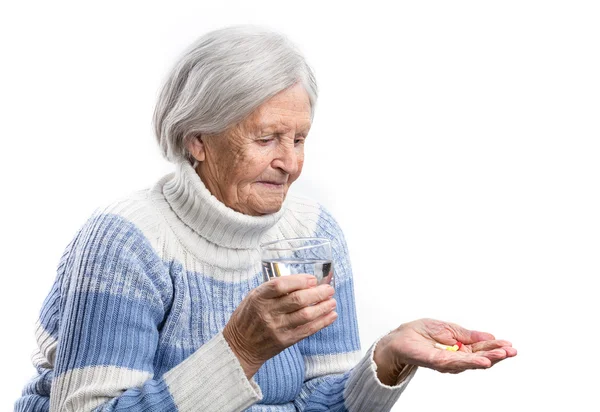 Yaşlı kadın onun ilaç — Stok fotoğraf