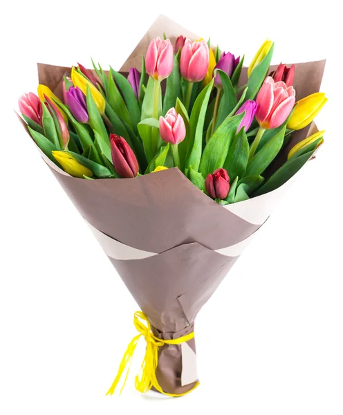 Bouquet of 25 colorful tulips in kraft paper, isolated on white — Stock Photo, Image