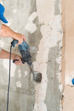 İnşaat işçisi delme deliği Evde onarım