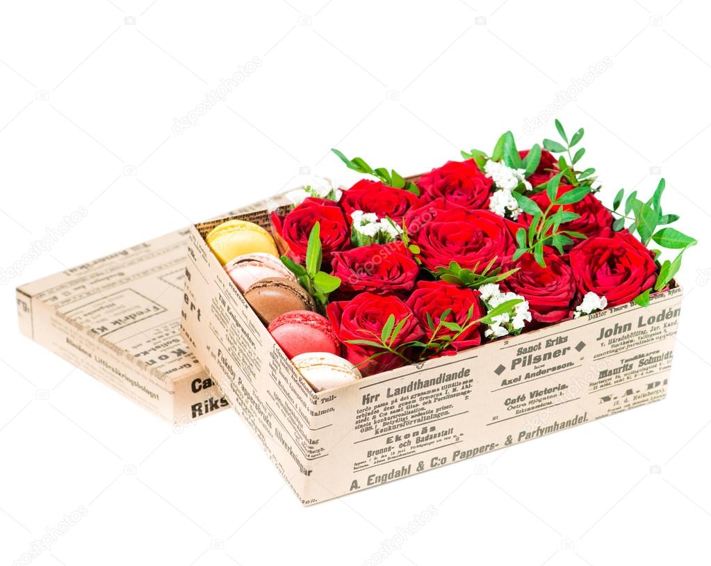 gift box with roses and cake macaroon isolated on white backgrou
