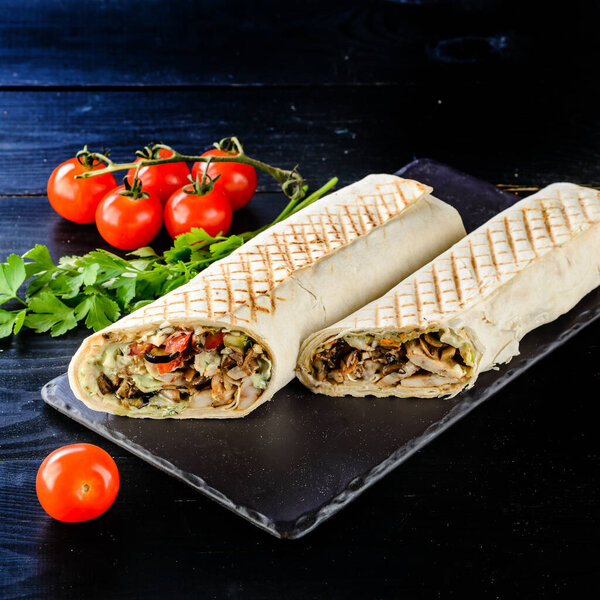 turkish shawarma with chicken and lamb in pita bread, classic tortilla wrap with grilled chicken