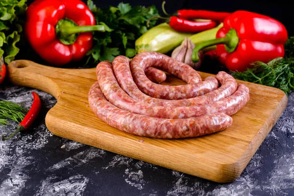 Fresh Raw Sausage Wooden Board Raw Barbecue Sausages Spices Vegetables — Stock Photo, Image