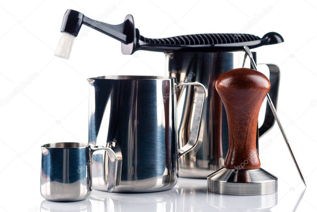 Set of Stainless Steel Milk Pitchers Jugs. Foaming Jug. Latte art for barista. Coffee Accessories. Barista Kit isolated on a white background