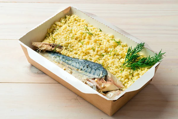 Sous Vide mackerel fish and couscous in a takeaway box, saba or mackerel fish