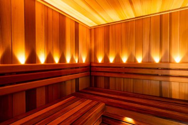 The Red Canadian Cedar Finnish Sauna interior with lights