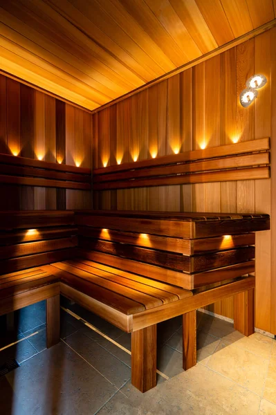 The Red Canadian Cedar Finnish Sauna interior with lights — Foto de Stock