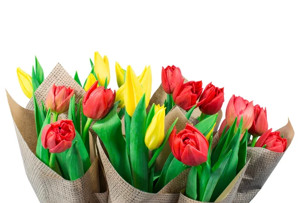 Bouquet of tulips in kraft paper — Stock Photo, Image