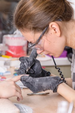 manikürcü iş yerinizde salon çivi (sığ Dof; co closeup