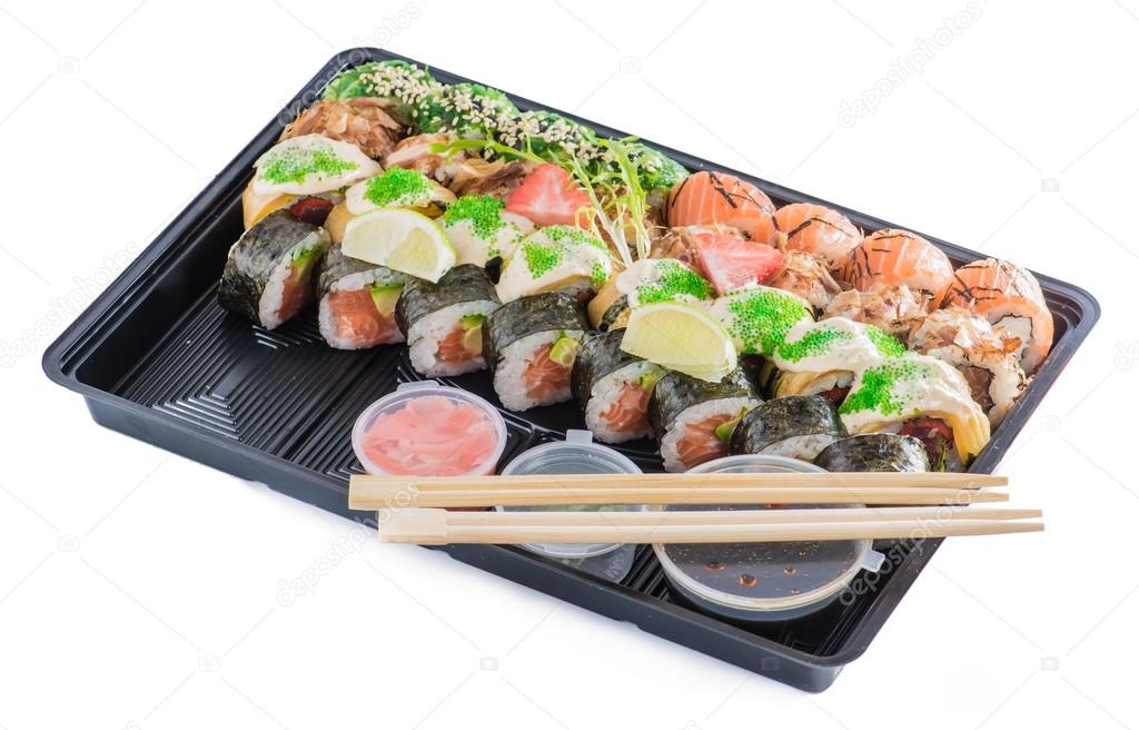 close-up of sushi roll in the black box, Sushi delivery. shallow