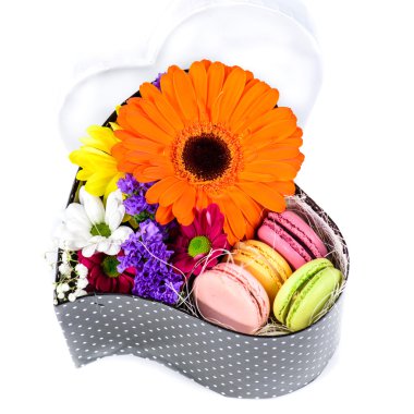 Closeup of  Flowers and macaroon in a box of heart shape (Shallo