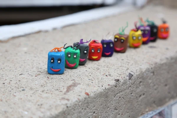 Cute multicolored company in queue standing happily — Stock Photo, Image