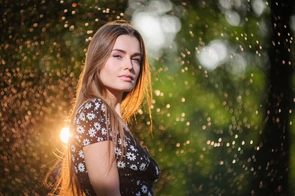 Portrait of a beautiful woman playing outside — Stock Photo, Image