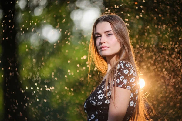 Portrait of a beautiful woman playing outside — Stock Photo, Image