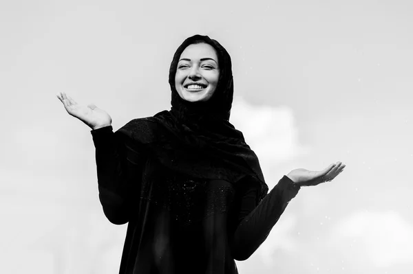 Beautiful middle eastern woman vait for rain — Stock Photo, Image