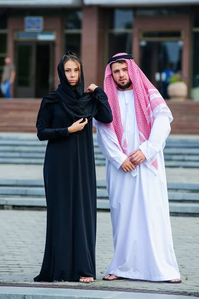 Middle Eastern Arabic couple posing outdoor