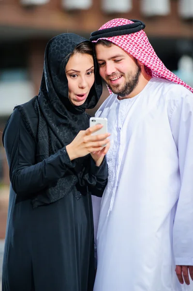 Moderm Arabic couple poses outdoors. — Stock Photo, Image