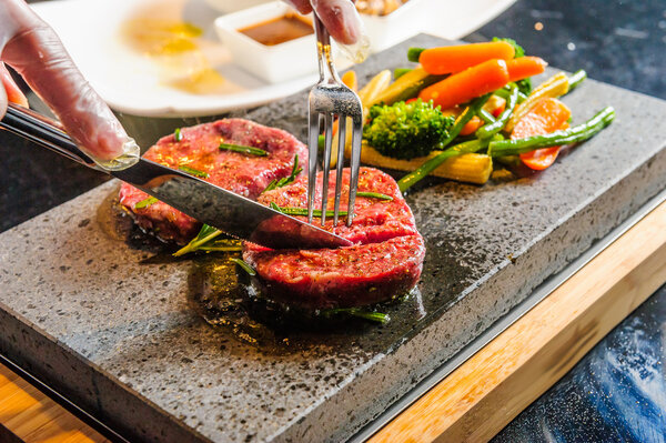 Steak cooked on lava-stone