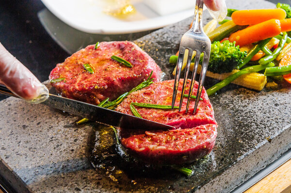 Steak cooked on lava-stone