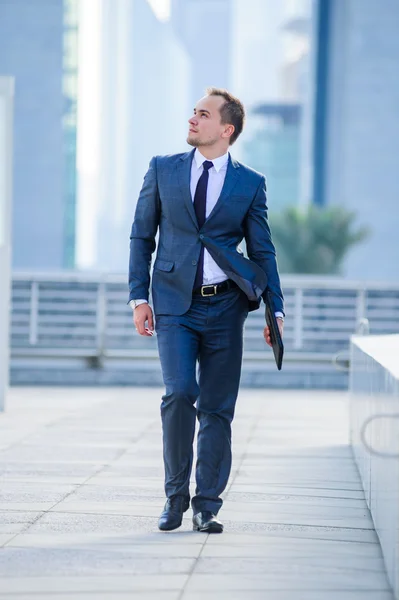 Portrait of yang businessman in suit outdoors.European man. — Stock Photo, Image