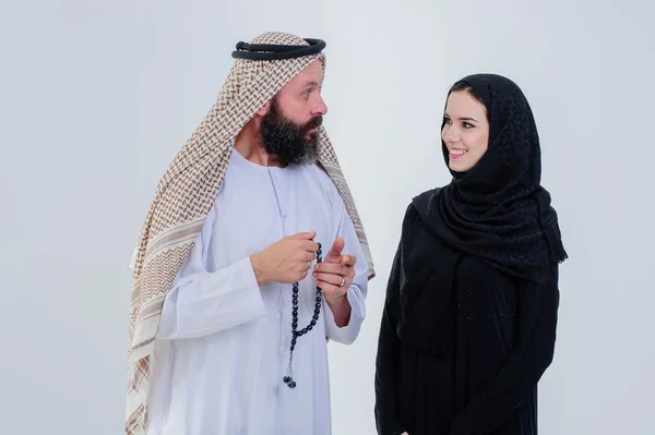 Half body of arabic couple posing together isolated on grey background. — Stock Photo, Image