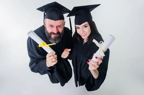 Dos estudiantes adultos graduados felices . — Foto de Stock