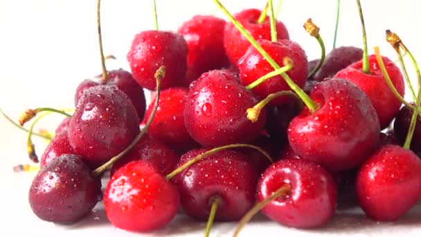 Pile of ripe sweet cherries macro 4K dolly shot — Stock Video