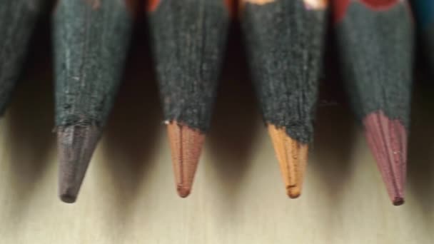 A set of black wood color pencils, pencil leads macro dolly shot — Stock Video