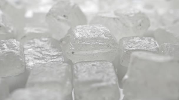 Extreme close up dolly video of white sugar crystals — Stock Video