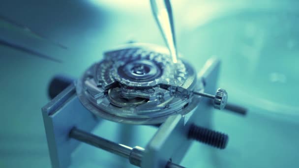 Watch movement being repaired in a repair shop. Macro video — Stock Video