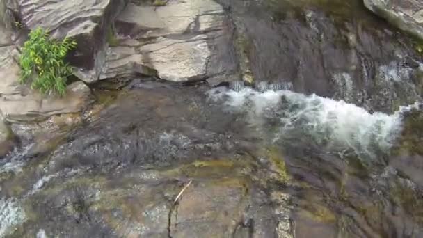 Slow motion aerial video of tropical waterfall with transparent water — Stock Video