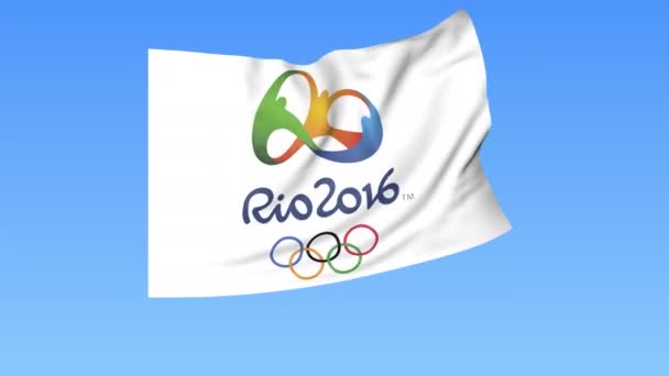 Размахивание флагом Олимпийских игр в Рио-2016, бесшовный цикл. Точный размер, синий фон. Часть флага установлена. 4K ProRes, альфа — стоковое видео