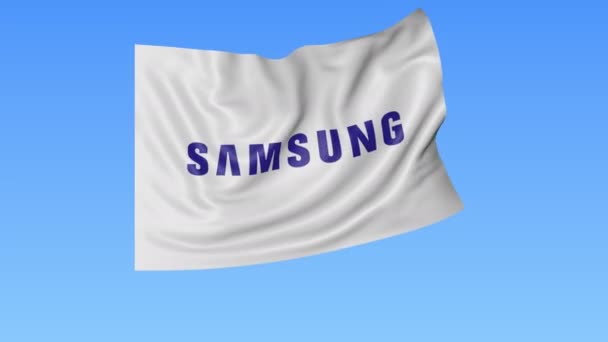 Bandera ondeando con el logotipo de Samsung, lazo sin costuras, fondo azul. Animación editorial. 4K ProRes, alfa — Vídeo de stock