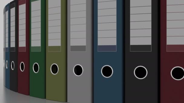 Roterande mångfärgade bindemedel. 4 k sömlös loopable animation — Stockvideo