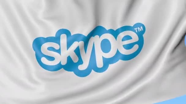 Primer plano de la bandera ondeante con inscripción de Skype, bucle sin costuras, fondo azul. Animación editorial. 4K ProRes, alfa — Vídeo de stock