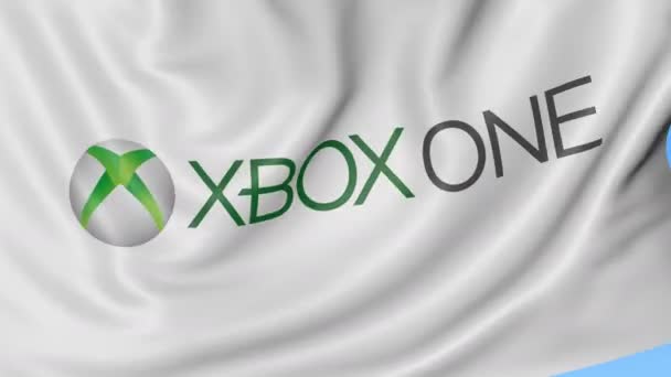 Κοντινό πλάνο της κουνώντας τη σημαία με το λογότυπο Xbox One, αδιάλειπτη βρόχο, μπλε φόντο. Σύνταξης κινούμενα σχέδια. 4 k Prores, alpha — Αρχείο Βίντεο