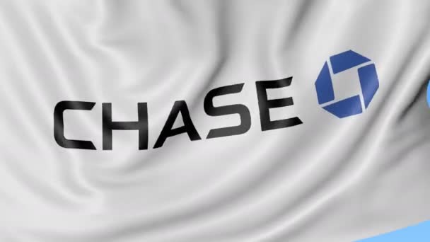 Nahaufnahme des Fahnenschwenkens mit jpmorgan chase bank logo, nahtlose Schleife, blauer Hintergrund. redaktionelle Animation. 4k prores, Alpha — Stockvideo