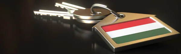 Flag of Hungary on the keychain and keys. Property rental or real estate market concepts, 3d rendering — Stock Photo, Image