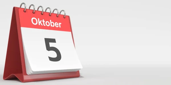 5 de octubre fecha escrita en alemán en la página del calendario flip. renderizado 3d — Foto de Stock