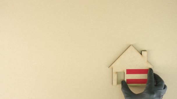 Εικονίδιο σπιτιού από χαρτόνι με σημαία Αυστρίας, έννοια της αγοράς ακινήτων — Αρχείο Βίντεο